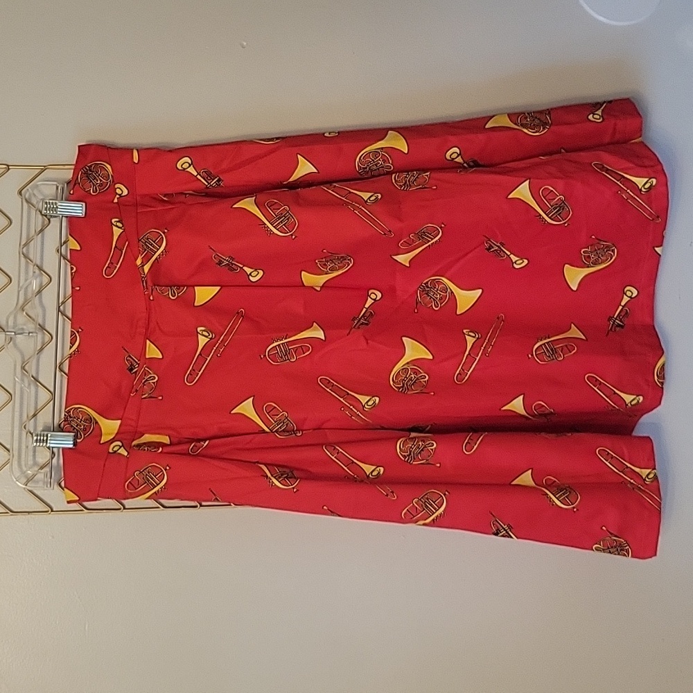 Lindy Bop red skirt with brass instruments